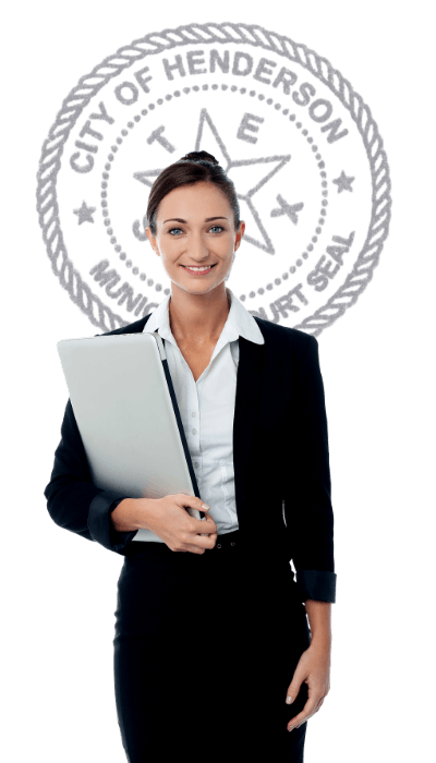 Woman in business suit holding laptop computer