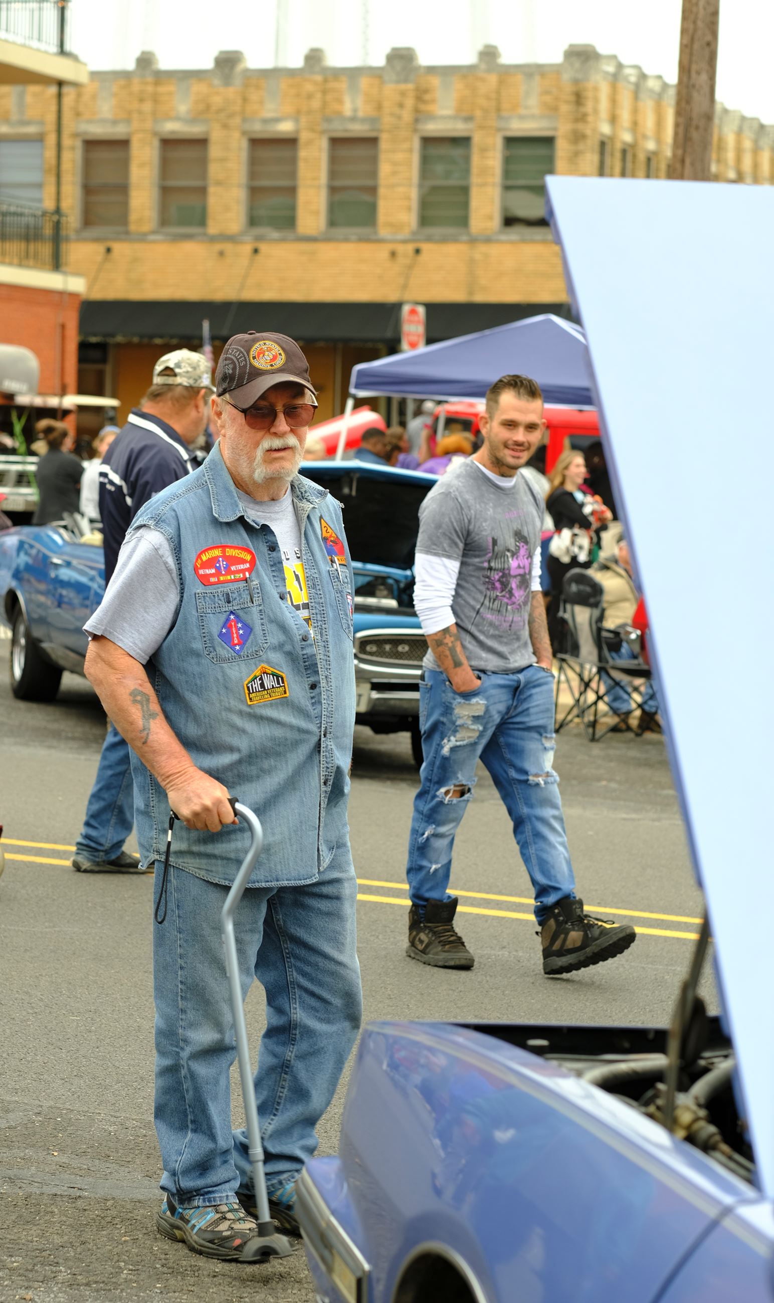 Man Admires Classic Car
